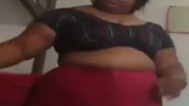 Telugu bhabhi gets her big boobs exposed as she gets dressed up infront of her secret lover