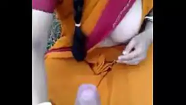 Mature village aunty doing an outdoor blowjob