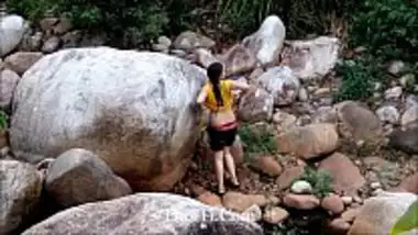 Hot Nepali girl dressing after an outdoor bath