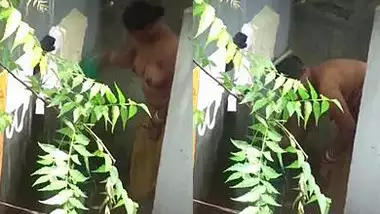 Big boobs Desi bhabhi nude bathing neighbor boy caught by hidden cam