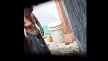 Indian village bhabhi nude during bath and recording by hidden cam