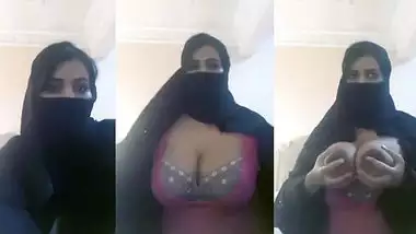 Pretty Desi beauty in hijab demonstrates massive XXX jugs on camera