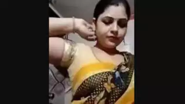 bubbly radhika bhabhi in saree showing her huge boobs & fatty pussy leaked mms