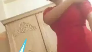 Sex show of playful Desi girl in red who slowly strips down