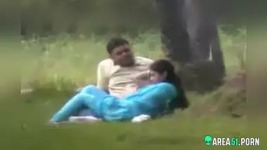 Beautiful Indian wife in blue saree with her lover in public park