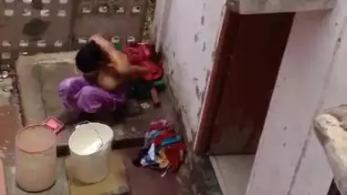 Big tits desi bhabhi shower video filmed by neighbor in open