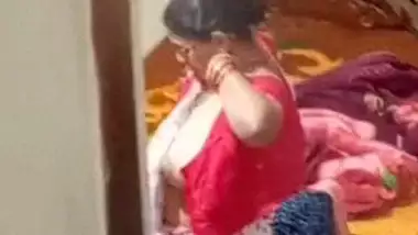 Aunty caught on hidden cam while dressing video