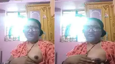 Indian mature aunty showing boobs to lover